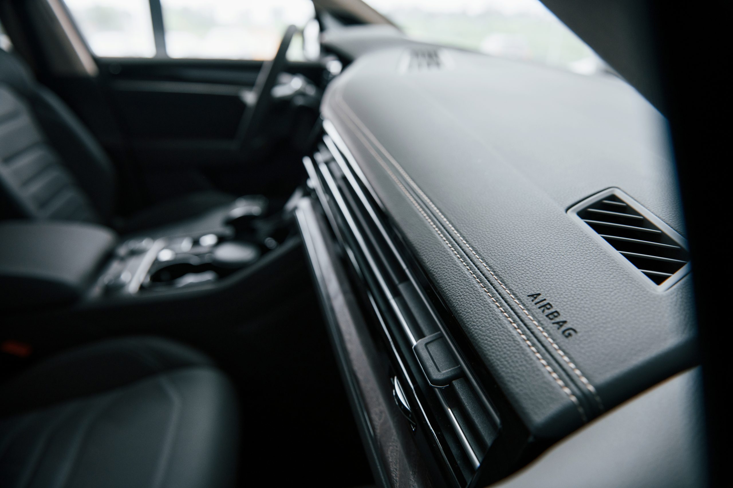 Place for airbag. Close up view of interior of brand new modern luxury automobile Auto Upholstery Atlanta GA